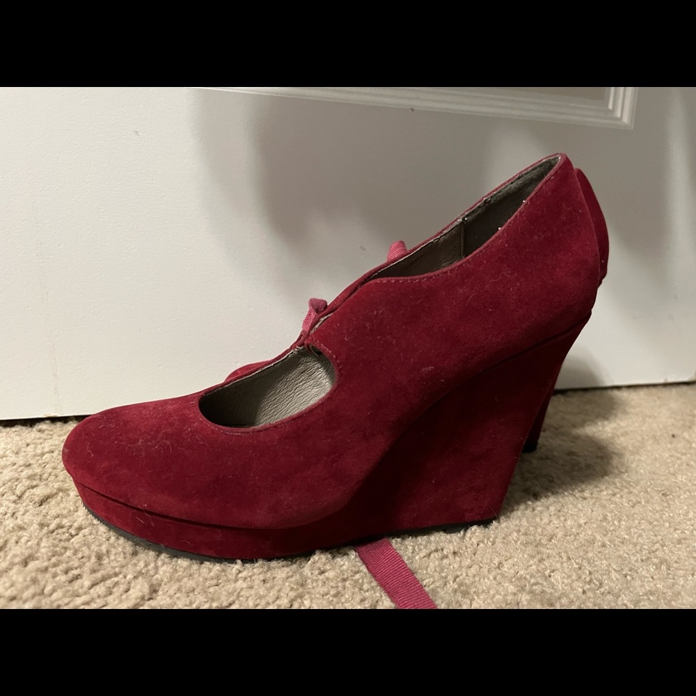 Heels. They are lace up in the front. Maroon